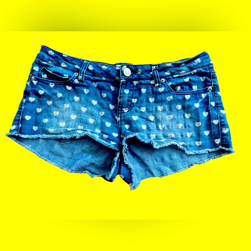 Jean cut off shorts. Denim with white hearts. Size 7